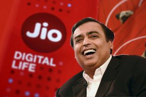 Mukesh Ambani and Reliance Jio logo